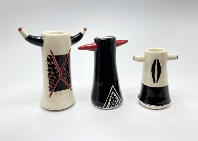 small-ceramic-bud-vases-all-one-of-a-kind-black-white-and-red-highlights-so-much-character-you-cant-have-just-one