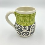 spring-green-with-matte-black-and-white-texture-create-a-beautiful-contrast-in-this-handbuilt-ceramic-coffee-mug