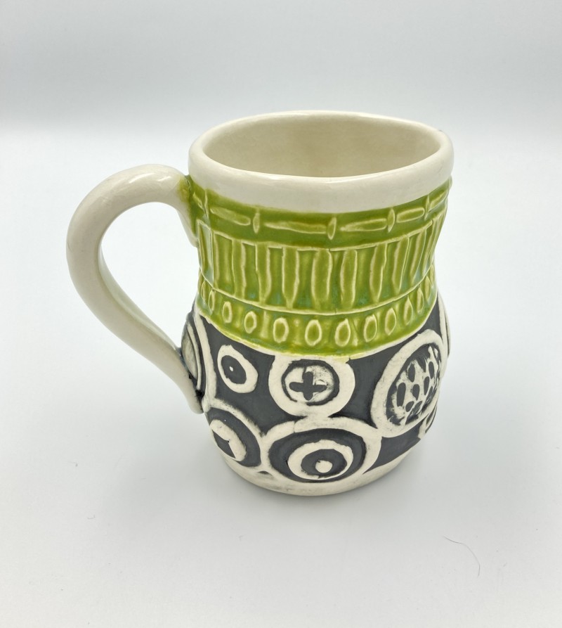 spring-green-with-matte-black-and-white-texture-create-a-beautiful-contrast-in-this-handbuilt-ceramic-coffee-mug
